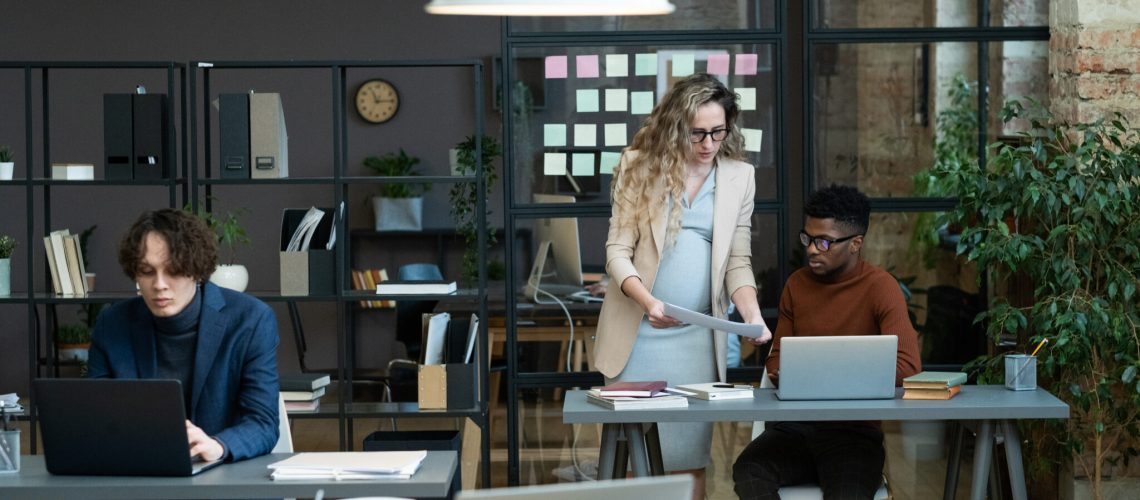 Businesswoman working with her colleagues at office