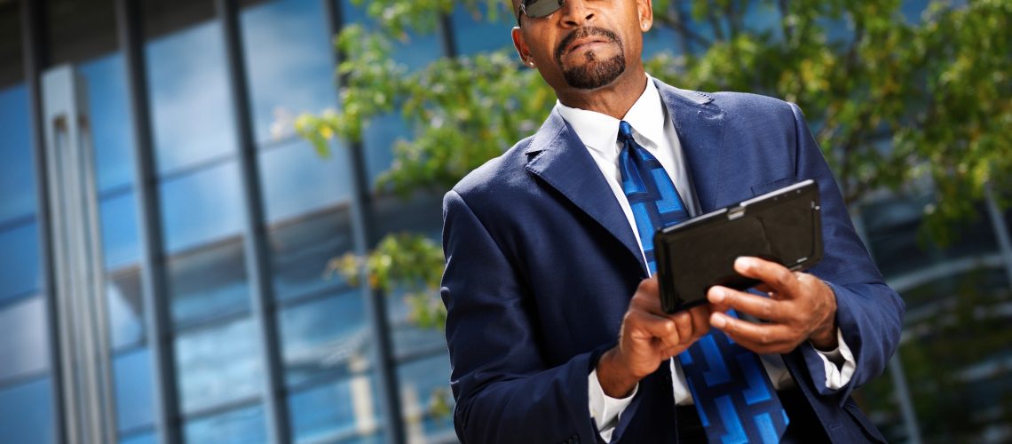 cool-professional-business-executive-with-tablet