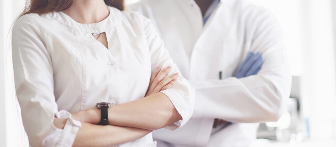 Laboratory laboratories conduct experiments in a chemical laboratory in transparent flasks. Output formulas